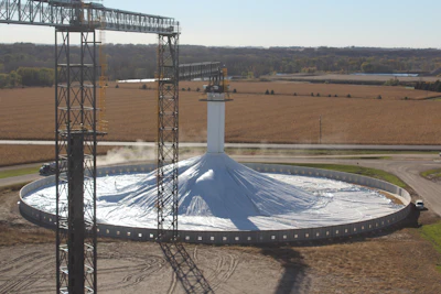 Covered ground pile being filled at harvest.