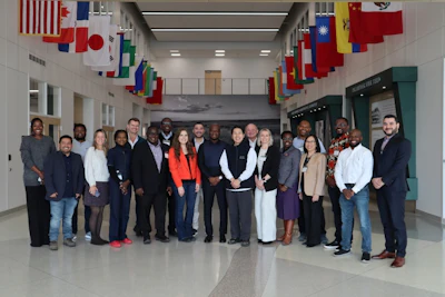 The U.S. Grains & BioProducts Council (USGBC) and North Dakota Corn recently welcomed a delegation of energy and transportation sector stakeholders to the Northern Crops Institute (NCI) for a course on ethanol production and procurement. Pictured at NCI are USGBC Ethanol Consultant in Mexico Christian Santamaria (second from left); USGBC Deputy Regional Director for Europe and the Middle East Ana Maria Ballesteros (fourth from left); USGBC Regional Ethanol Consultant for the Middle East and Africa Gbenga Apampa (eighth from left); USGBC Director in Japan Tommy Hamamoto (eighth from right); USGBC Director for Global Ethanol Export Development Alicia Koch (seventh from right); and USGBC Ethanol Consultant Rowena Torres-Ordonez (fourth from right).