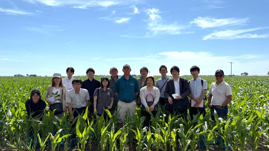 The U.S. Grains & BioProducts Council (USGBC) recently led a group of Japanese feed industry leaders and journalists to Nebraska and Iowa to showcase the sustainable production practices of U.S. corn. Pictured with the team at a farm in Nebraska are USGBC Program and Administrative Manager Michiyo Hoshizawa (front, fourth from left); USGBC Director in Japan Tommy Hamamoto (rear, third from left); and USGBC Director of Global Sustainability Carlos F. Su&aacute;rez (rightmost).