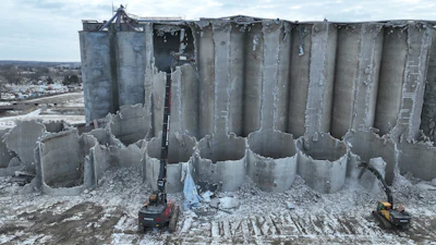 The demolition of 146 concrete silos in Lincoln, Nebraska, is slated to be completed by the end of 2026. The high-reach demolition excavator extends 120 feet, enabling a safer structure removal from the top to bottom.