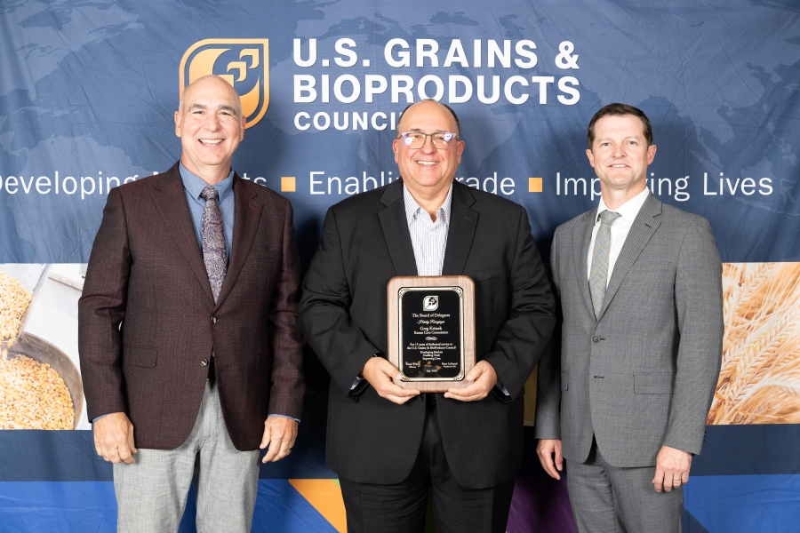 Kansas Corn CEO Emeritus Greg Krissek (center) was honored for his 15 years of service to the U.S. Grains & BioProducts Council (USGBC) last month. Pictured with Krissek are USGBC Past Chairman Mark Wilson (left) and USGBC President and CEO Ryan LeGrand (right).