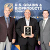 Kansas Corn CEO Emeritus Greg Krissek (center) was honored for his 15 years of service to the U.S. Grains & BioProducts Council (USGBC) last month. Pictured with Krissek are USGBC Past Chairman Mark Wilson (left) and USGBC President and CEO Ryan LeGrand (right).