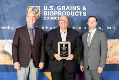 Kansas Corn CEO Emeritus Greg Krissek (center) was honored for his 15 years of service to the U.S. Grains & BioProducts Council (USGBC) last month. Pictured with Krissek are USGBC Past Chairman Mark Wilson (left) and USGBC President and CEO Ryan LeGrand (right).