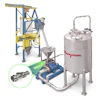 Industrial bulk handling system with overhead gantry crane, pump unit, storage tank, and conveyor equipment for material processing