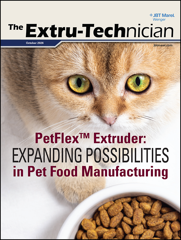 Orange tabby cat with striking yellow-green eyes gazing at a white bowl of pet kibble on magazine cover