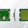 LED module or semiconductor component showing green PCB with yellow grid pattern and metallic connectors from front and side views