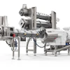 Industrial twin-screw extruder processing machine with motors and control systems on white background