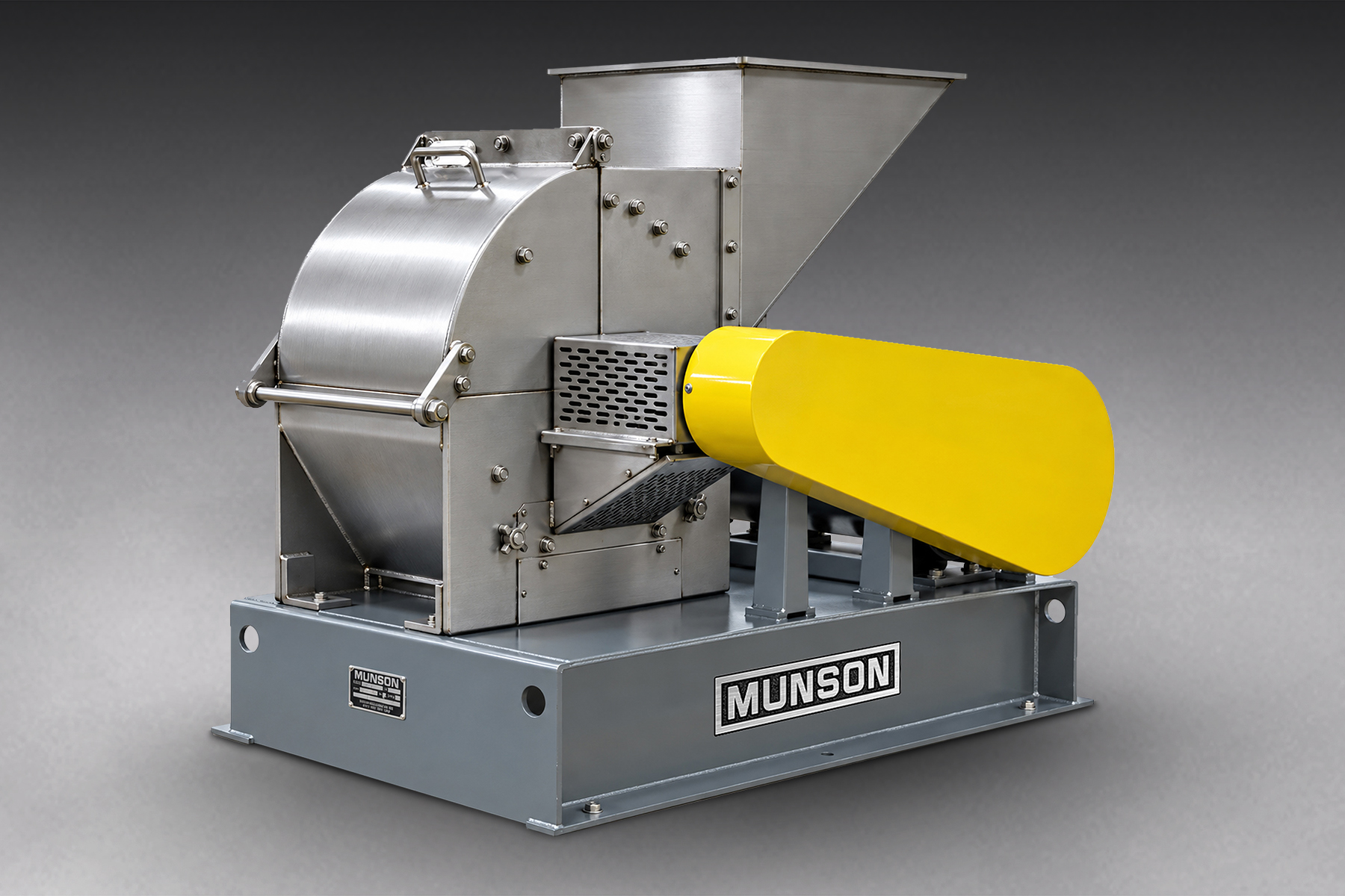 Munson industrial mixer grinder with stainless steel drum and yellow motor on gray base