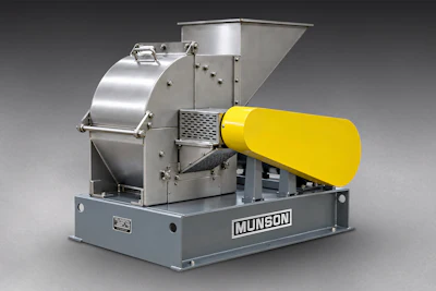 Munson industrial mixer grinder with stainless steel drum and yellow motor on gray base